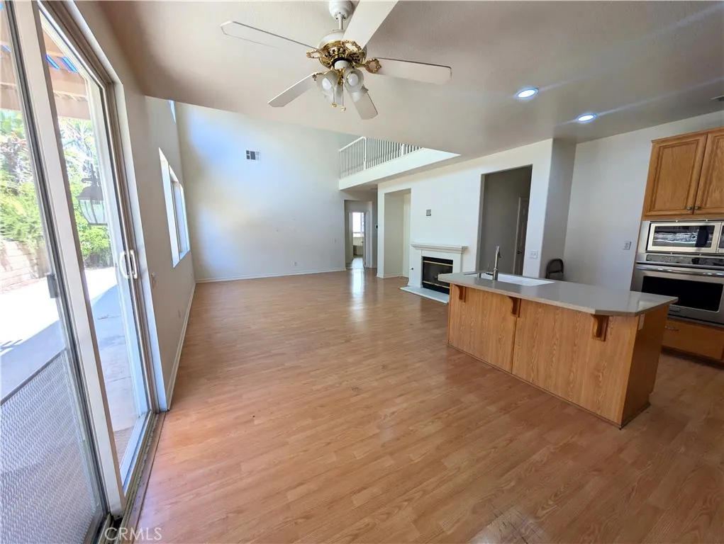 VIEW FROM BREAKFAST NOOK TO FAMILY ROOM