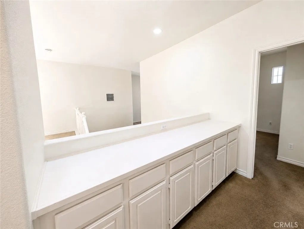 UPSTAIRS CABINETS AND BEDROOM 3