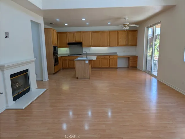 FAMILY ROOM VIEW TO OPEN KITCHEN