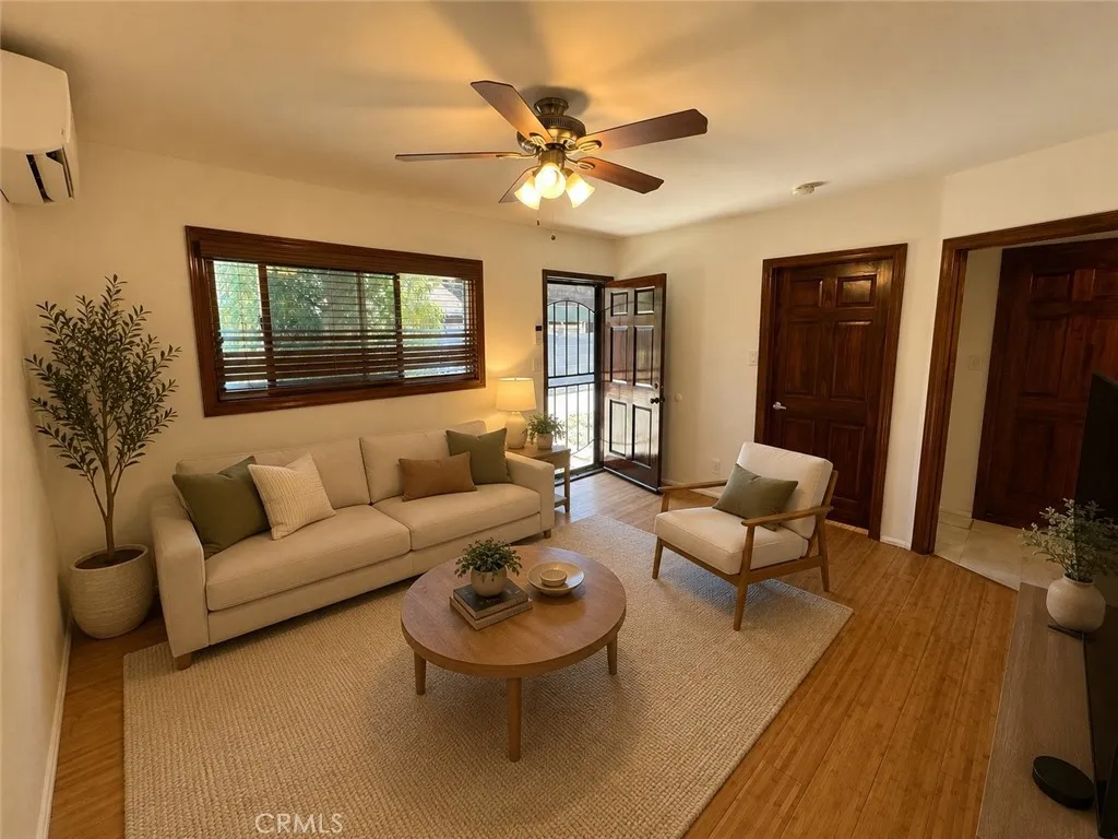 *AI Staged Rendering of living room*