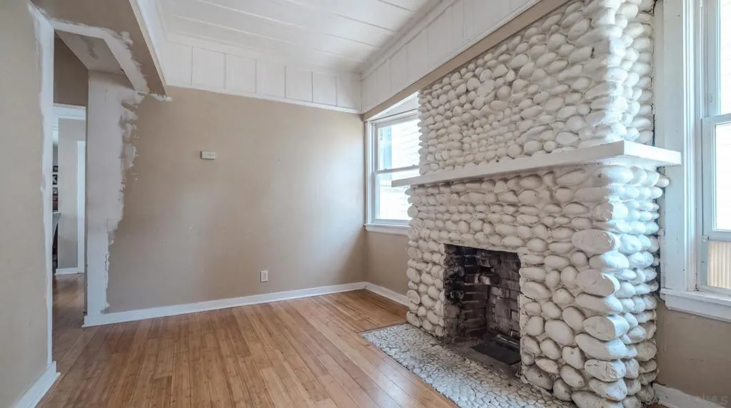 AI/Digitally Altered sitting room- Currently being used as a bedroom by tenant