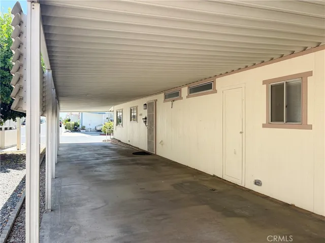Clean long carport side porch
