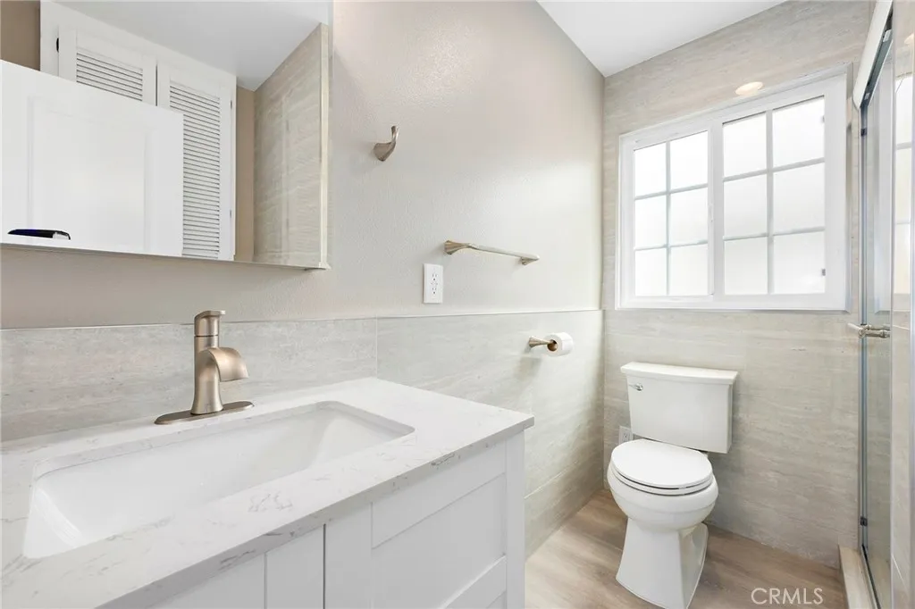 Brand new modern bathroom with step in shower. No details spared.