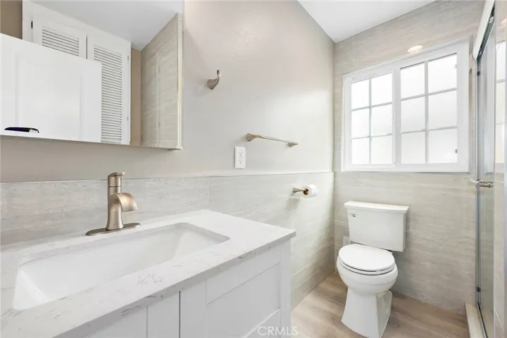 Brand new modern bathroom with step in shower. No details spared.