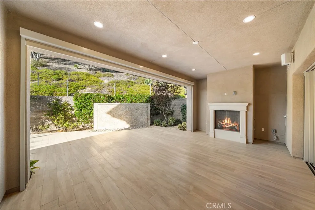 Outdoor Fireplace and open area.