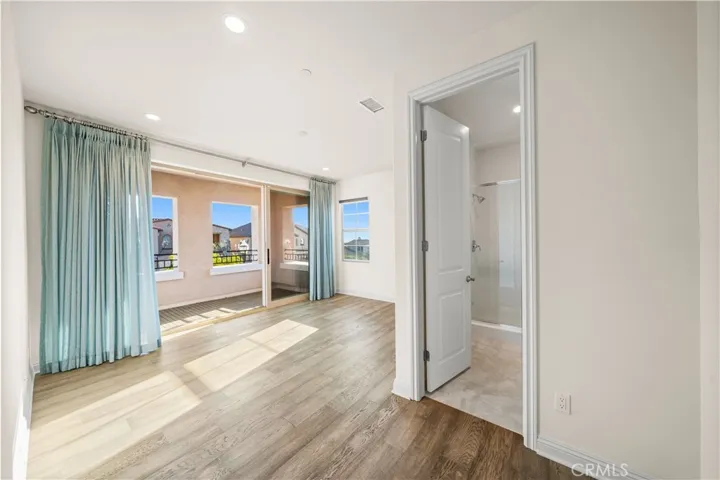Upstairs bedroom suite with balcony