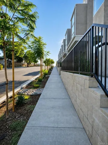 Wide sidewalks and contemporary architecture throughout the community.