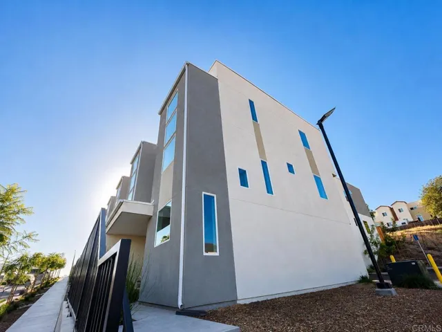 Contemporary 3-story end-unit townhome with striking modern architecture and abundant natural light.