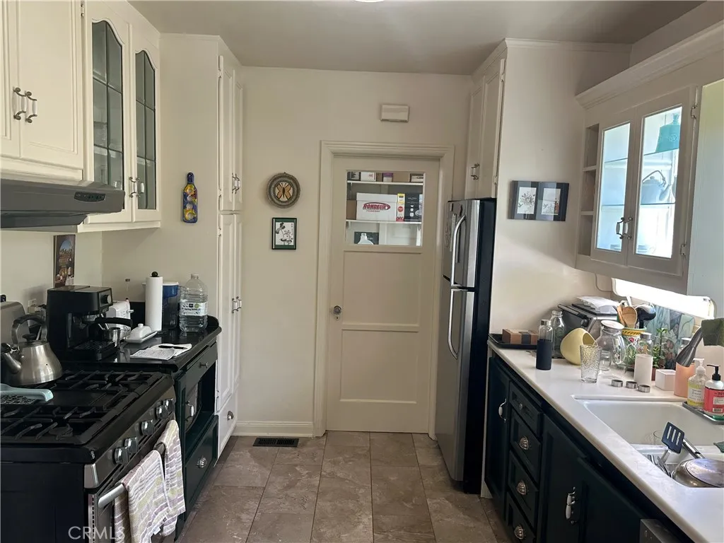 Kitchen and doorway to laundry and the half bathroom