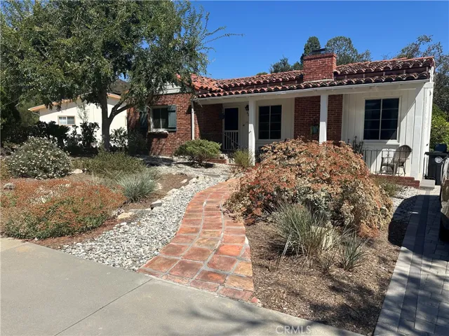 Front of house, native plants landscaping for low water usage, tiled front walkway
