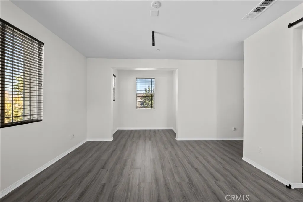 Bedroom Four - Primary offers an additional space for use as a reading nook or small office
