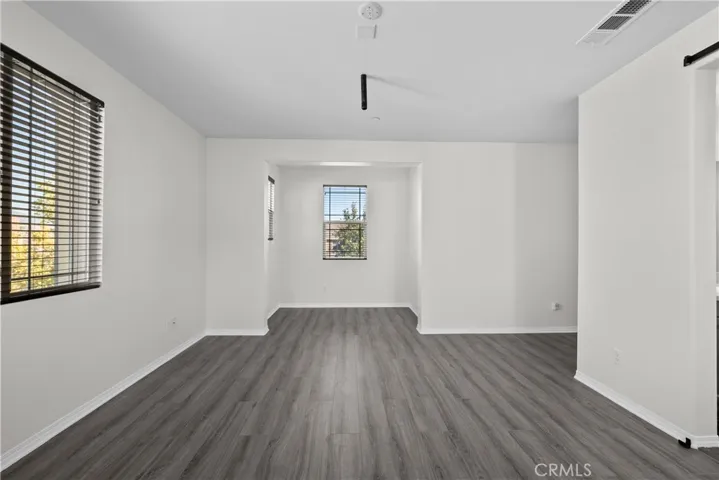 Bedroom Four - Primary offers an additional space for use as a reading nook or small office
