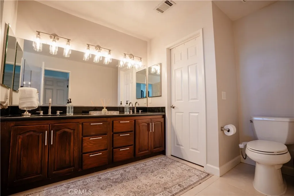 Primary Bathroom with walk-in closet