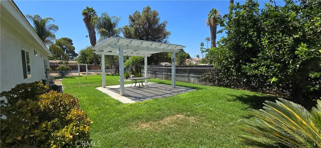 Back yard now has fence dividing front home from back home with access gate so both yards are private.