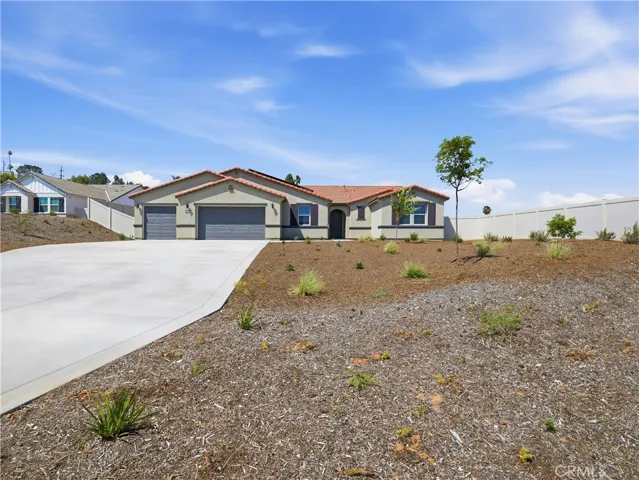 Front with 4 car garage