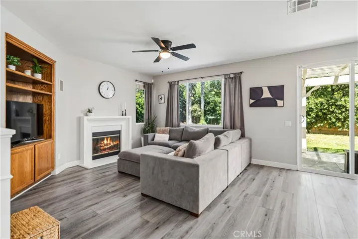 Virtually staged to add flames in fireplace