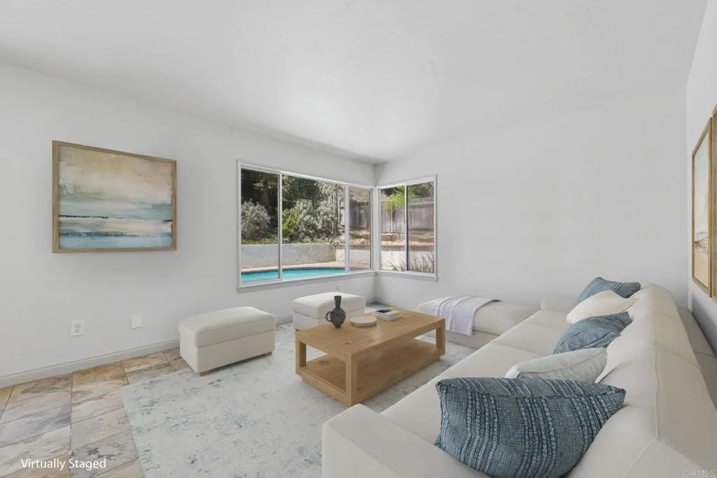 With exterior views of the pool and backyard.