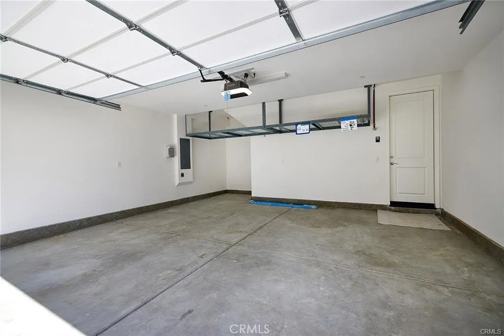 Spacious 2 Car Garage with Overhead Storage