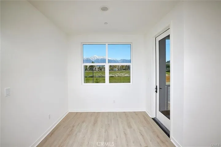 Dining Area with Door that Leads to Patio