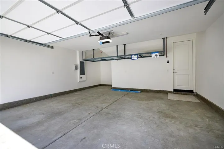Spacious 2 Car Garage with Overhead Storage