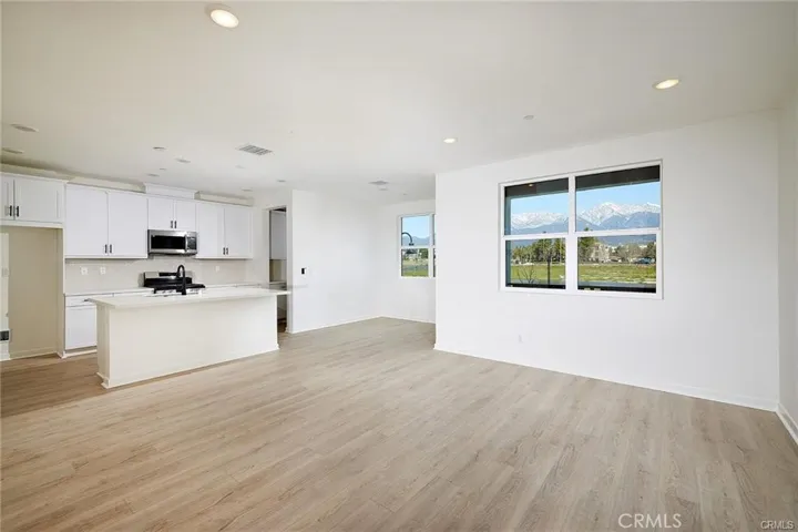 Spacious Kitchen that Opens Into the Dining Area and Living Room