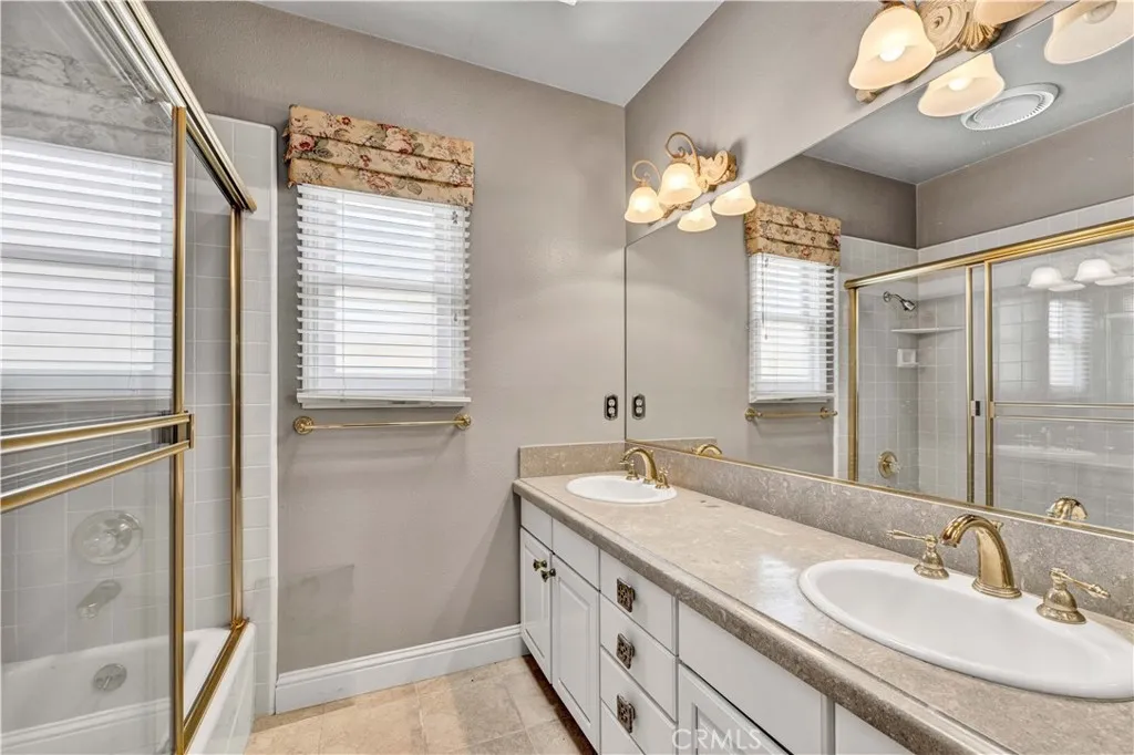 SECONDARY FULL BATH LOCATED OFF THE HALLWAY