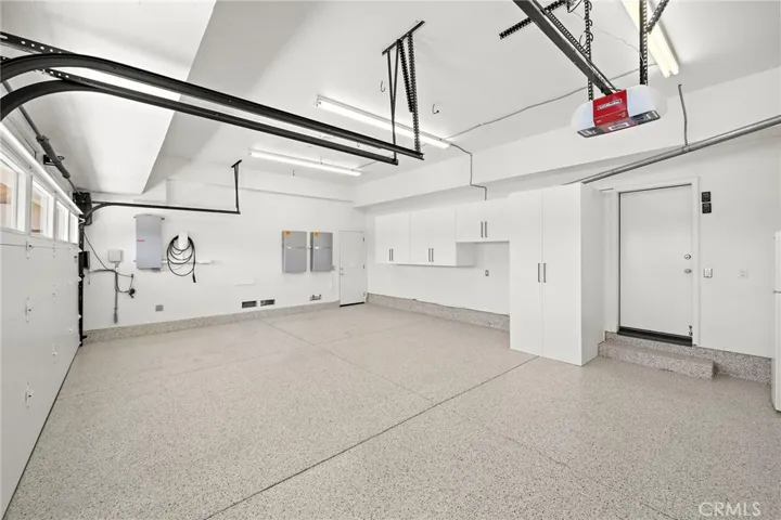 3 car garage with Tesla charger
