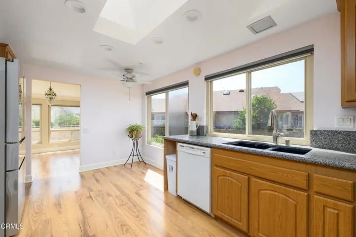 Kitchen has space for table.