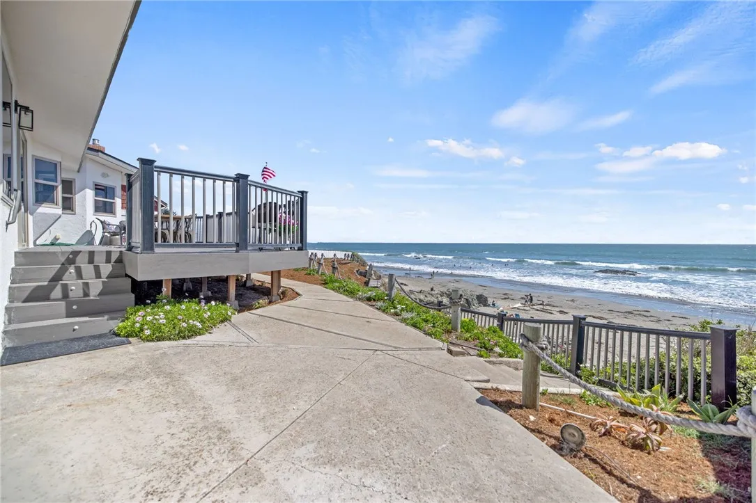 Backyard walkway down to beach deck