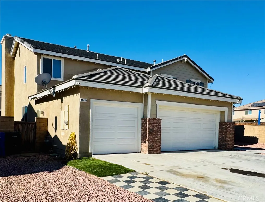 3 Car Garage. Single Door Garage and 2 Door Garage