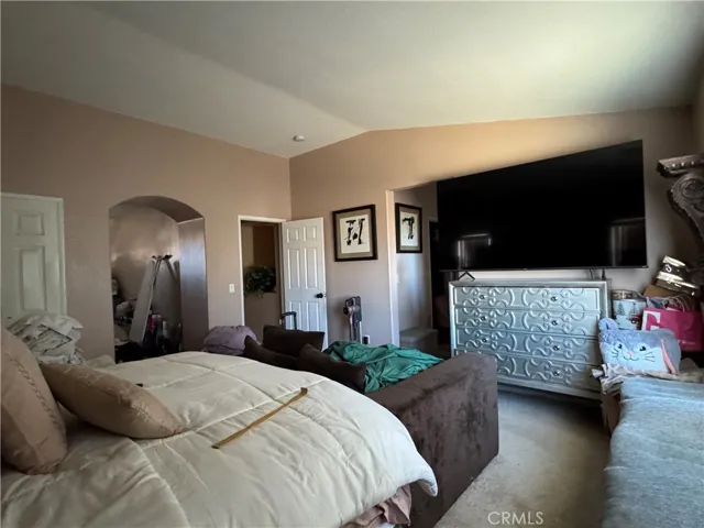 Spacious Primary Bedroom with Arched Retreat