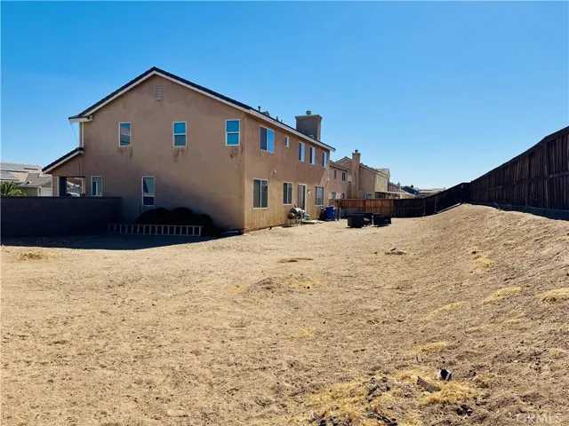Large Back Yard Waiting For Your Vision To Become Reality