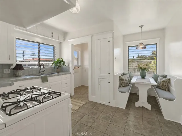 Kitchen with breakfast nook, and laundry room
