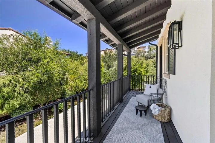 Balcony overlooking the front yard, access from bedroom #3 and #4
