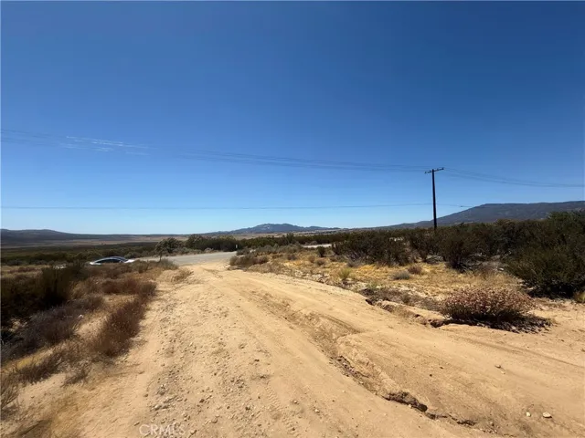 dirt roads on north and south perimeter of property