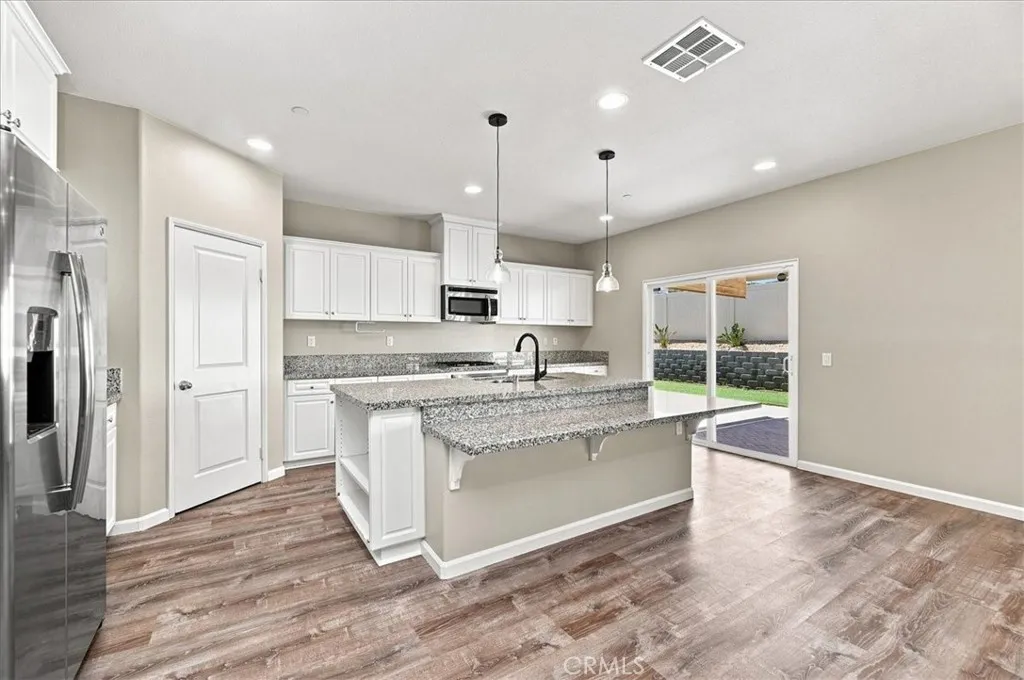 Kitchen with Pendent Lighting over Island
