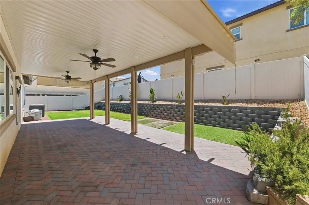 Patio Cover has pull down shades for privacy
