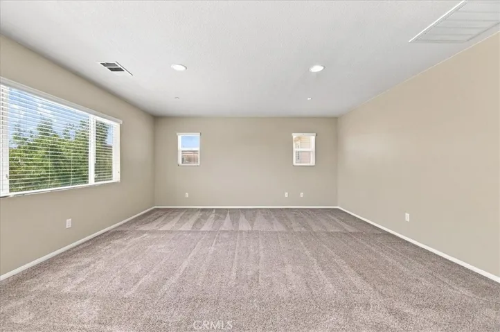Primary Bedroom with Recessed Lighting