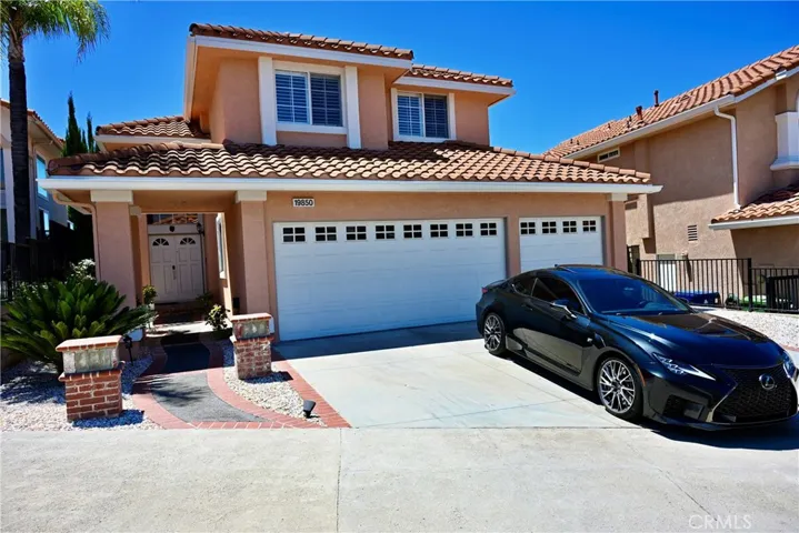 Front of home w/3 car attached garage