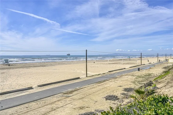 Watch the waves or take a walk!    This is across the street from the condo!