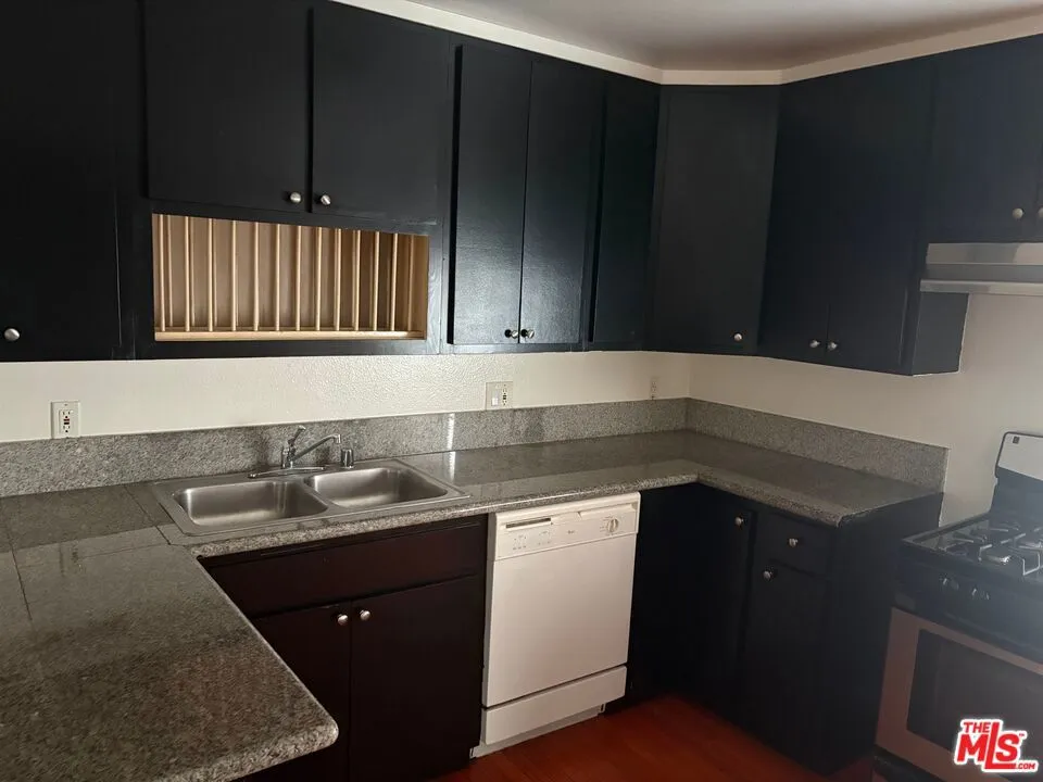 Unit F . 5TH Ave Kitchen 1c