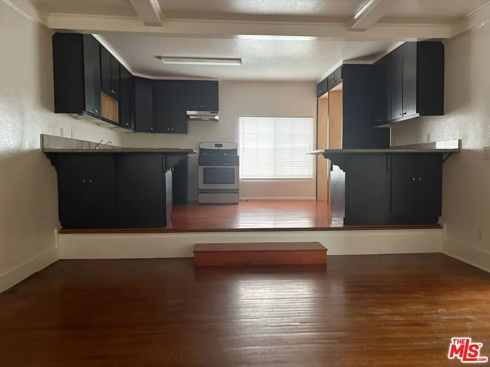 Unit F . 5TH Ave Kitchen 1a
