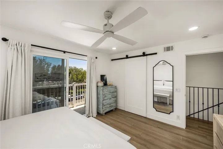 Primary Bedroom with balcony