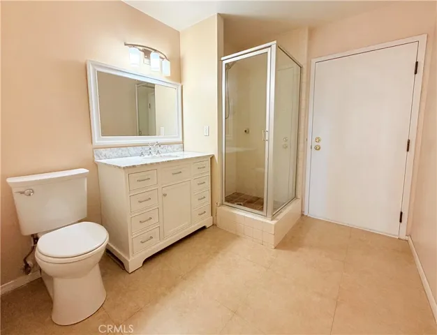 Bathroom Downstairs with door to exit condo