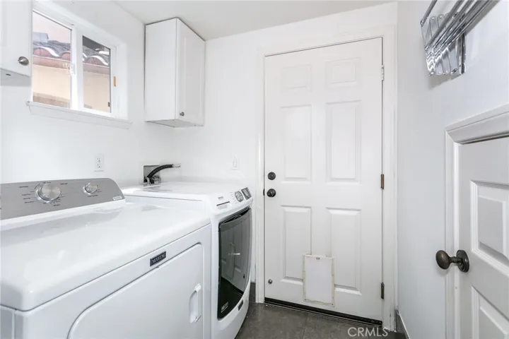 Laundry off the kitchen to the garage