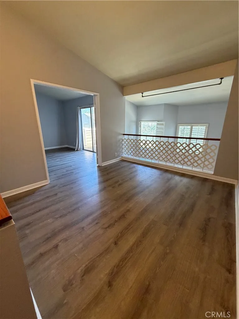 Upstairs primary retreat featuring loft and bedroom