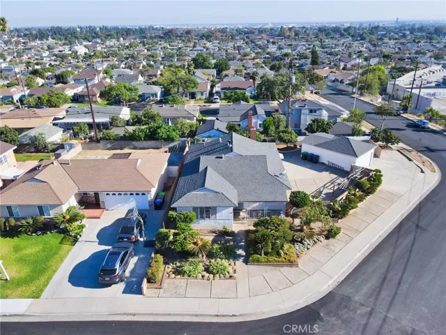 Aerial View of the house situated on a spacious corner lot.