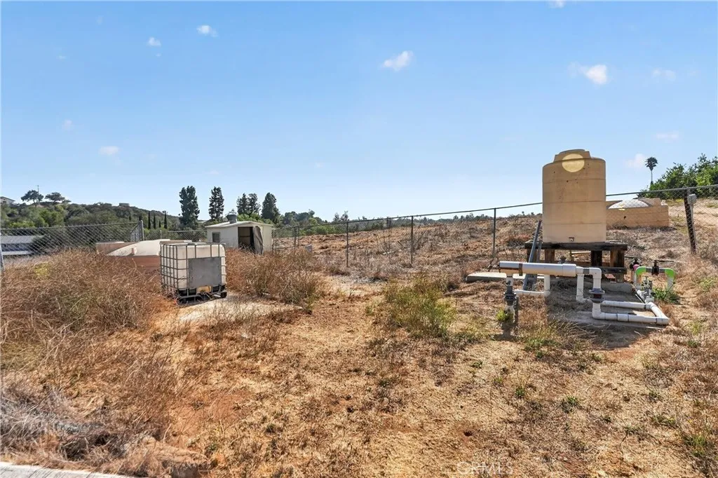 LOCATED ON ADJACENT  TEN ARE PROPERTY  AND PART OF 30- ACRE GROVE IRRIGATION SYSTTEM  CONNECTING  BOTH  WELLS  FROM EACH PROPERTY  AND ESTABLISHED FERTIGATION SITE.