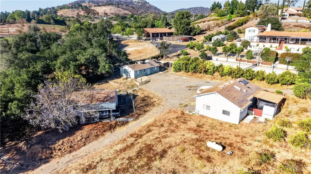 OVER ALL AERIAL VIEW  OF NE CORNER OF  20 ACRES  SHOWING THE 3  MODULAR  UNITS