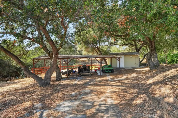 ADDITION COVERED STORAGE AND  STORAGE SHED.